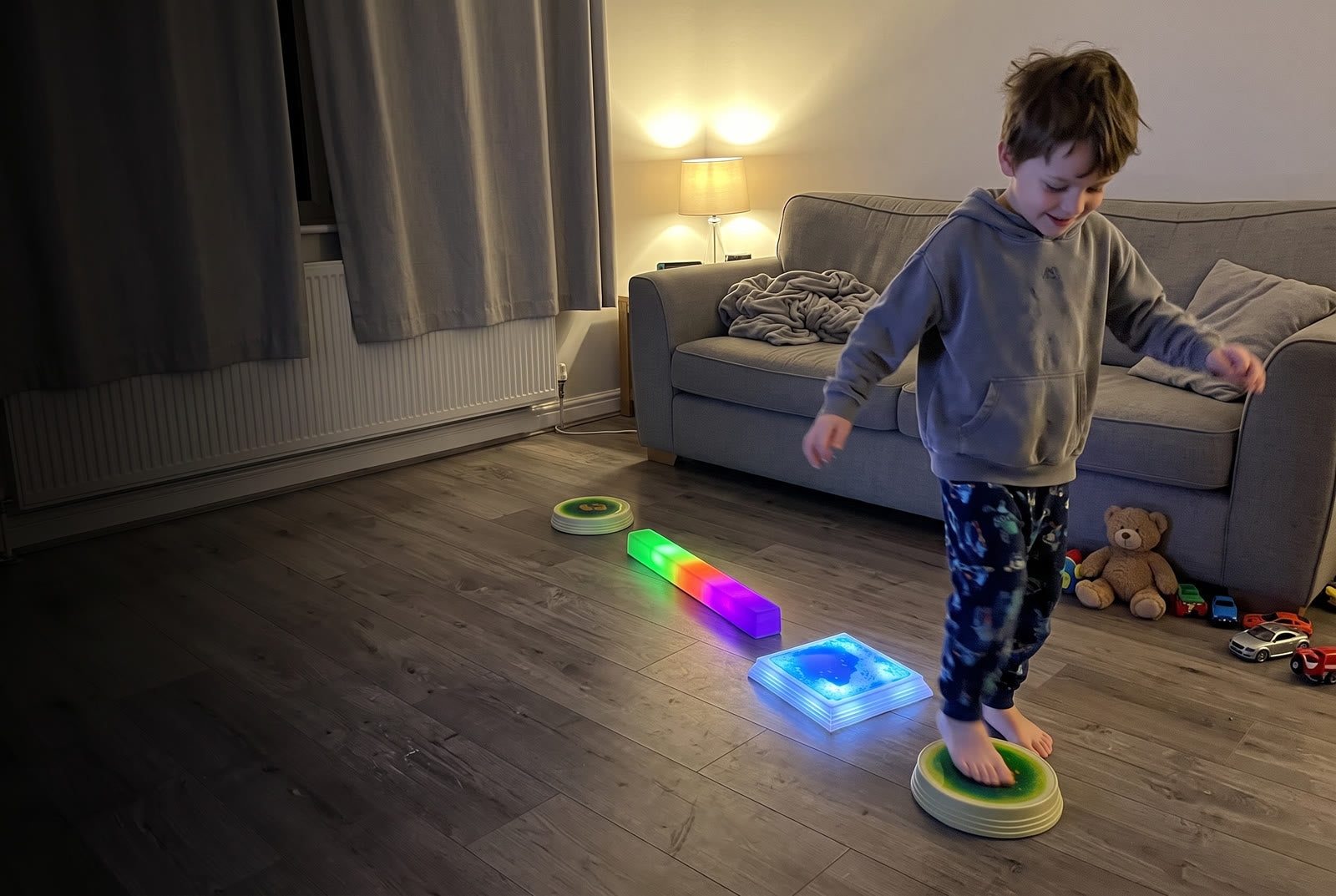 A child stepping across glowing liquid stones at home
